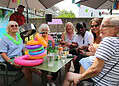 They enjoyed singing to steel band performer Mark Cherrie, a delicious BBQ spread and birthday cake topped with flowers. 