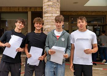 Eltham College students in Mottingham celebrate their 'pleasing' GCSE results.