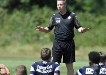 The returning Millwall boss speaks to his squad in pre-season during his first spell in 2015. Photo: Millwall FC