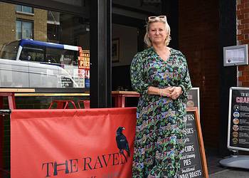 Michelle Tempest, standing outside The Raven on Tower Bridge Road. Photo by Adrian Zorzut.