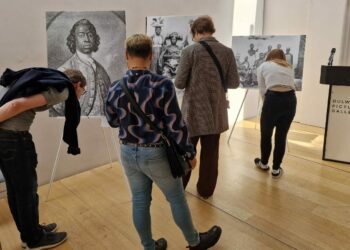 Visitors enjoying the previous photographic exhibition at the Dulwich Picture Gallery