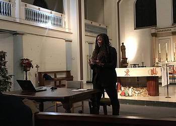 Miatta Fahnbulleh speaking at a Walworth Society meeting at St Peter's Church on January 18