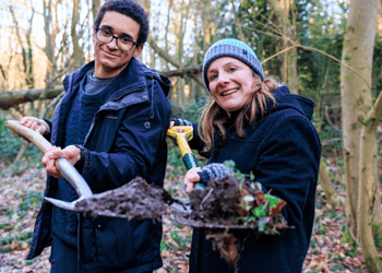 Kate Bradbury and Xavier Mahele get digging! The first of the 100 new ponds for the new London Blue Chain walking route, created by Froglife and funded by The National Lottery Heritage Fund © Oliver Dixon