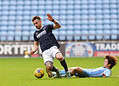 Joe Bryan clashed with Tatsuhiro Sakamoto in the first half of Millwall's defeat at Coventry on Sunday. Image: Millwall FC