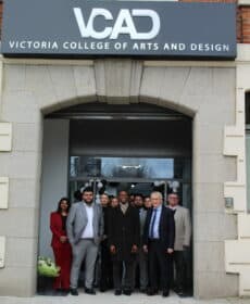 Michael Situ (centre) at the opening of the Victoria College of Art and Design