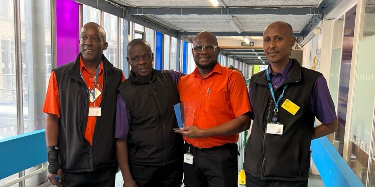 Kabiru (right centre) with his porter colleagues