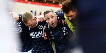 Neil Harris spoke to his players on the pitch after the game. Image: Millwall FC