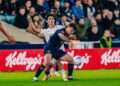 Jenson Metcalfe competes for the ball against Swansea City. Image: Millwall FC