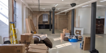 Set-up work at the Small Press Futures bookshop (credit: UK Small Press Futures)
