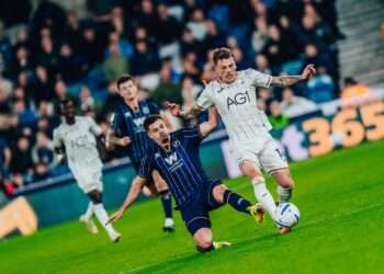 Camiel Neghli lunges in during Millwall's 1-0 defeat to Swansea City. Image: Millwall FC